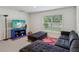 A spacious bonus room provides flexibility and comfort with a window overlooking the outdoors at 6043 Piedmont Dr, Spring Hill, FL 34606