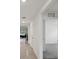 A hallway that leads to different rooms at 6043 Piedmont Dr, Spring Hill, FL 34606