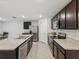 Well-appointed kitchen with stainless steel appliances, granite countertops, and ample cabinet space at 6043 Piedmont Dr, Spring Hill, FL 34606
