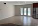 Open-concept living room with recessed lighting and access to the pool area through glass doors at 6474 29Th N Ave, St Petersburg, FL 33710