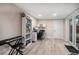 Bright home office space with desk, shelving, and convenient exterior door to back yard at 670 42Nd Ne Ave, St Petersburg, FL 33703