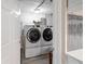 Laundry room featuring a modern front-loading washer and dryer at 670 42Nd Ne Ave, St Petersburg, FL 33703
