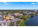 Aerial view showcasing the city, lakefront, and historic building, with lush trees at 701 Mirror Lake N Dr # 103, St Petersburg, FL 33701
