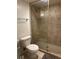 Tile shower stall with glass door, alongside a toilet in the bathroom at 701 S Madison Ave # 410, Clearwater, FL 33756
