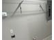Unfinished basement space, ready for customization, with visible electrical components, a sink, and shelves at 7021 Parliament Dr, Tampa, FL 33619