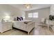 Bedroom with white furniture, complemented by light-colored walls and hardwood floors at 755 Green Valley Rd, Palm Harbor, FL 34683
