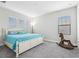 Serene bedroom with plush carpeting and great natural light from three windows at 808 Vittorio Pl, Brandon, FL 33511