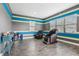 Versatile bonus room with comfortable seating, ample natural light, and modern decor, ideal for relaxation or recreation at 808 Vittorio Pl, Brandon, FL 33511