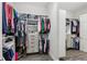Spacious walk-in closet with custom shelving and ample storage for clothes and accessories at 808 Vittorio Pl, Brandon, FL 33511