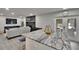 Open floor plan with fireplace, living room, and access to the outdoors at 8222 Valrie Ln, Riverview, FL 33569