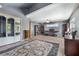 Spacious bedroom featuring natural light, wood floors, a ceiling fan, and a mirrored closet at 9011 Baywood Park Dr, Seminole, FL 33777