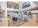 Bright and airy living area with an open floor plan and loft, seamlessly connecting to the kitchen and dining at 9011 Baywood Park Dr, Seminole, FL 33777