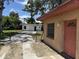 Backyard area offering privacy and a detached building for potential studio or workshop space at 902 Marshall St, Clearwater, FL 33755