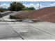 Flat roof surface showing pooled water, a nearby sloped roof and signs of deterioration, requiring maintenance at 902 Marshall St, Clearwater, FL 33755
