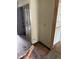 Hallway featuring closet with louvered doors and an exterior door at 902 Marshall St, Clearwater, FL 33755