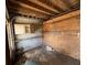 Image of bare room showing plywood walls, concrete blocks, storage shelves, and cabinets at 902 Marshall St, Clearwater, FL 33755