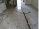 Renovation opportunity: Spacious room with tiled floors needing repair and restoration at 902 Marshall St, Clearwater, FL 33755