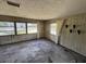 Sun room with many windows and wood paneled walls at 902 Marshall St, Clearwater, FL 33755