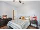 Inviting bedroom with closet, neutral tones, and hardwood flooring at 10435 Deerberry Dr, Land O Lakes, FL 34638
