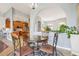 Charming dining area with a round table and chairs, seamlessly connected to the open kitchen space at 10435 Deerberry Dr, Land O Lakes, FL 34638
