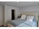 A bright bedroom with a cozy bed, closet and neutral decor that creates a relaxing atmosphere at 10573 Oakside Dr, Palmetto, FL 34221