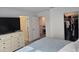 Bedroom with TV on dresser and closet at 10573 Oakside Dr, Palmetto, FL 34221
