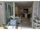 View of the modern living room and kitchen area with an open floor plan at 10573 Oakside Dr, Palmetto, FL 34221