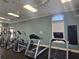 Community gym featuring treadmills, ellipticals, and modern exercise equipment at 11078 Heathrow Ave, Spring Hill, FL 34609