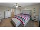 Spacious main bedroom featuring a ceiling fan and neutral tones, creating a relaxing atmosphere at 11287 Cay Spruce Way, San Antonio, FL 33576