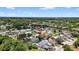 Aerial view highlighting the neighborhood setting, with mature trees and a network of residential streets at 11320 Partridge Dr, Tampa, FL 33625