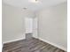 Neutral bedroom with wood floors and a closet at 11320 Partridge Dr, Tampa, FL 33625