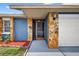 Charming front entrance with stone accents and a cozy porch at 11320 Partridge Dr, Tampa, FL 33625