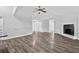 Bright living room featuring modern floors, fireplace, and neutral walls at 11320 Partridge Dr, Tampa, FL 33625