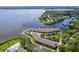An aerial view of waterfront condos with private docks and amazing water views at 115 Brent Cir, Oldsmar, FL 34677