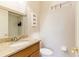 Well-lit bathroom with granite countertop and modern fixtures at 115 Brent Cir, Oldsmar, FL 34677