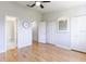 Bright bedroom with hardwood floors and lots of closet space at 115 Brent Cir, Oldsmar, FL 34677
