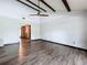 Living room featuring wood floors and vaulted ceilings at 11525 Country Oaks Dr, Tampa, FL 33618