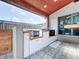 Outdoor kitchen area with a grill, white cabinetry, and an open view of the backyard at 11525 Country Oaks Dr, Tampa, FL 33618