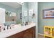 Bright bathroom featuring a double vanity, modern fixtures, and tasteful decor at 11849 Forest Park Cir, Bradenton, FL 34211