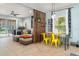 Dining area seamlessly connects to the living room, featuring stylish decor and ample seating at 11849 Forest Park Cir, Bradenton, FL 34211
