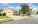 Attractive one-story home with well-kept lawn, two-car garage and pleasant landscaping at 11849 Forest Park Cir, Bradenton, FL 34211