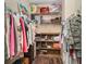 Well-organized walk-in closet with shelving, ample storage, and modern racks at 11849 Forest Park Cir, Bradenton, FL 34211
