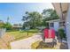 This backyard has an entertainment area with yard games, a fire pit and lots of room to enjoy your evenings at 1220 Magnolia Dr, Clearwater, FL 33756