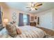Charming main bedroom with hardwood floors, soft colors, and a large bed, creating a cozy and inviting space at 1220 Magnolia Dr, Clearwater, FL 33756
