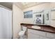 Bathroom with updated vanity and neutral decor at 13013 Sawmill Way, Hudson, FL 34667