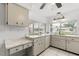 Bright kitchen with plenty of counter space and views of the backyard at 13013 Sawmill Way, Hudson, FL 34667