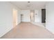 Bright living room boasts new carpet, neutral walls, and lots of natural light at 13013 Sawmill Way, Hudson, FL 34667