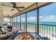Spacious balcony with ceiling fan and stunning views of the beach and ocean at 15000 Gulf Blvd # 901, Madeira Beach, FL 33708
