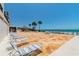 Relax on the deck lounge chairs with gorgeous views of the sandy beach and ocean at 15000 Gulf Blvd # 901, Madeira Beach, FL 33708