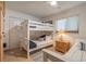 Cozy bedroom featuring a bunk bed and beach-themed decor at 15000 Gulf Blvd # 901, Madeira Beach, FL 33708